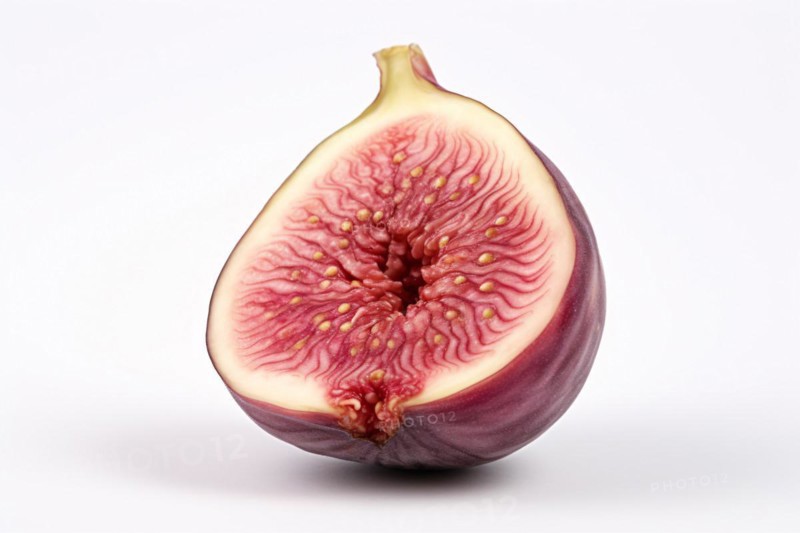 Halved fig on white background. KI generiert, generiert, AI generated
