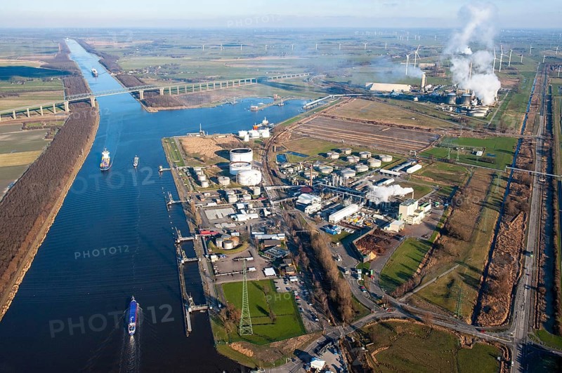Brunsbüttel, Landeshafen Ostermoor, Europe, Germany, Schleswig-Holstein, LNG, LNG Terminal, Ports, Port, harbour, ships, water, vessel, shipping, river, traffic, vessel traffic, traffic route, transport, means of transport, North Sea, Elbe, aerial photo, aerial view, aerial photograph, from, above, overview, logistics, loading, transshipment, storage, ammonia, industry, North Baltic Sea Canal, NOK, Europe