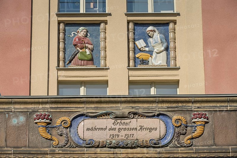 Midwives, relief on old building, former woman's and children's clinic, today St. Marien residential park, Mariendorfer Weg, Neukölln, Berlin, Germany, Europe