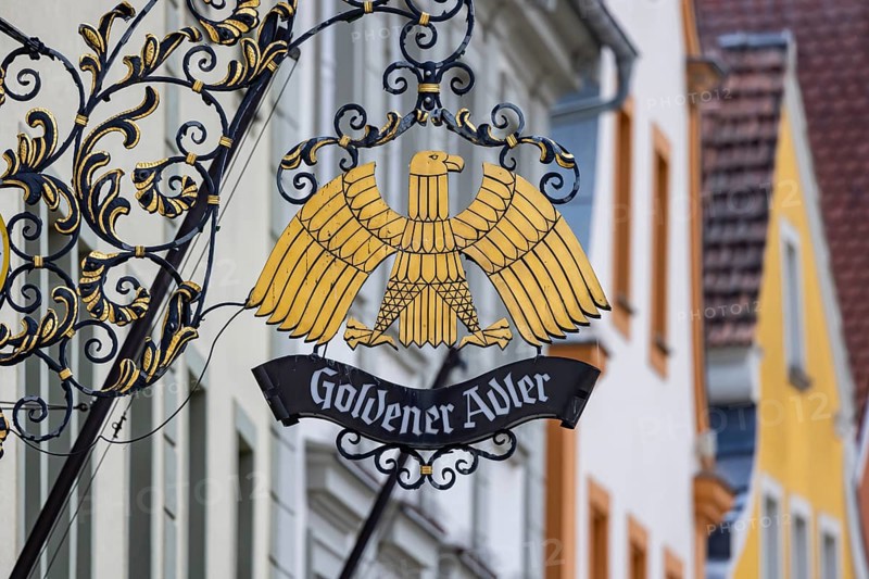Goldener Adler, inn sign in Ellwangen. The Ellwangen circle of CDU and CSU politicians met in the former inn in the post-war period. Ellwangen, Baden-Württemberg, Germany, Europe