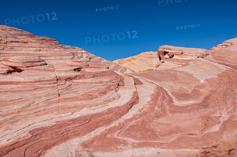 Layered rock formations along the Fire Wave Trail at Valley of Fire State Park near Overton, Nevada