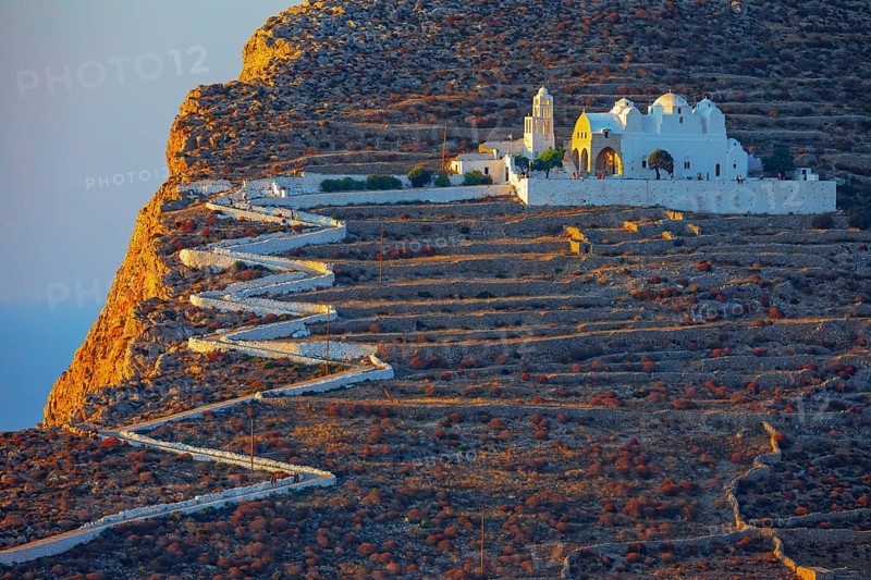 View of Panagia Kimissis church built on a cliff above the sea, Chora, Folegandros Island, Cyclades Islands, Greece, Europe
