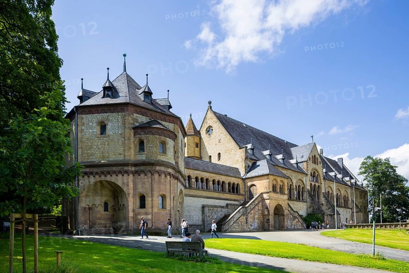 The imperial palace of Goslar covers an area of around 340 by 180 metres, situated at the foot of the Rammelsberg in the south of the town of Goslar, on which the imperial house, the former collegiate monastery St. Simon and Judas, the palace chapel of St. Ulrich and the Church of Our Lady are or were located. The imperial palace, built between 1040 and 1050 under Henry III, is a unique monument to secular architecture. For over 200 years, German and European history was written here at numerous imperial and court conventions. Copies of the Brunswick Lion and equestrian monuments in front of the imperial palace, Kaiserpfalz Goslar, Goslar, Lower Saxony, Germany, Europe