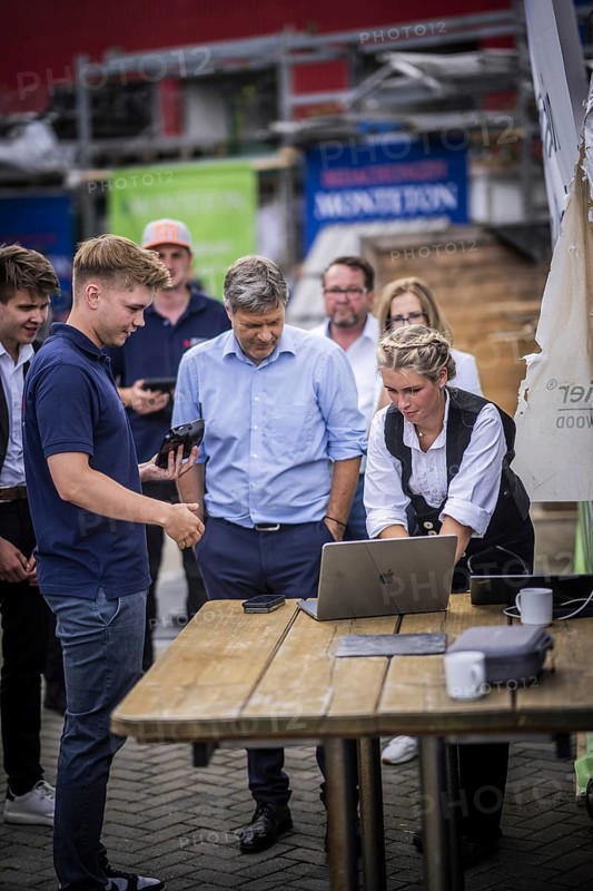 Federal Minister for Economic Affairs and Climate Protection Robert Habeck (Alliance 90/The Greens) on a summer tour of Germany. Here in Bochum, 10 July 2024, visiting a roofer with solar roof elements Photographed on behalf of the BMWK