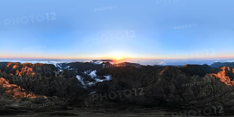 360 panorama of aerial drone view of mountains over clouds near Pico Ruivo on sunset. Madeira island, Portugal, Europe
