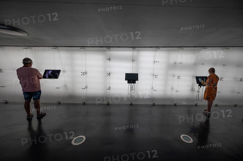 Visitors inform themselves on screens about the Air and Space Museum, Friedrichshafen, Baden-Württemberg, Germany, Europe