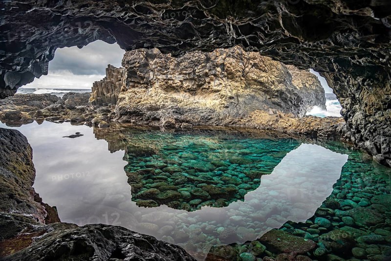 Lava cave with natural swimming pool at Charco Azul, El Hierro, Canary Islands, Spain, Europe