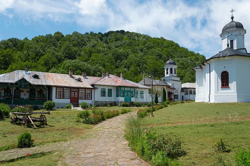 Monastery grounds with church, residential buildings and a path surrounded by trees and hills, Orthodox nunnery Suzana, Maneciu, Maneciu, Prahova, Muntenia, Romania, Europe