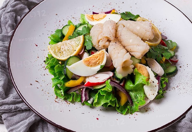 Salad of squid and vegetables, with egg, homemade, no people