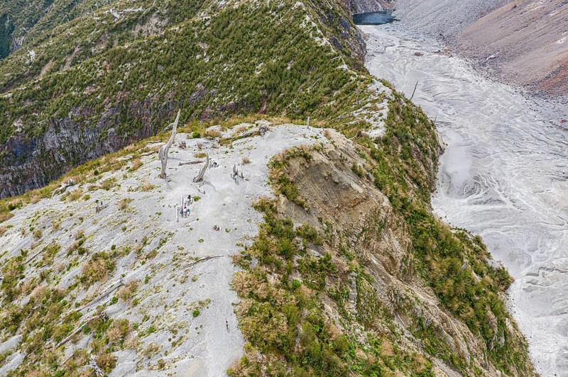 Tourists at the viewing point, hike to crater rim of Chaiten volcano, Park Pumalin, Patagonia, Chile, South America