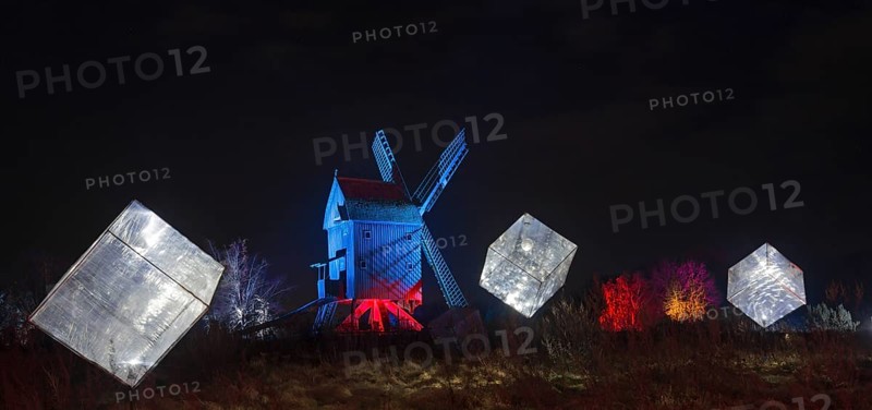 Windmill with illuminated cubes in a darkly lit scene at night, World of Lights, Illumination, Mill Museum, Gifhorn, Lower Saxony, Germany, Europe