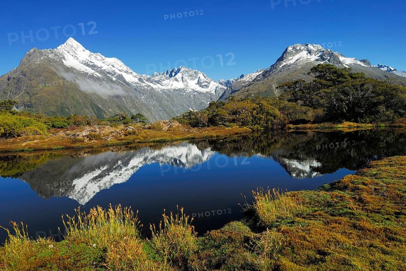 Key Summit with reflection of Mt Christina, Fiordland National Park, World Heritage Site South West New Zealand, West Coast, South Island New Zealand, Fjordland, South Island, New Zealand, Oceania