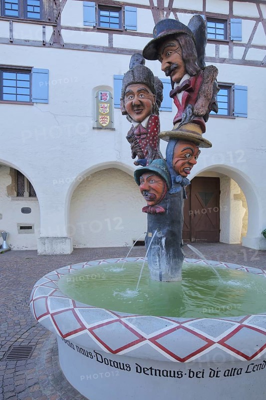 Fool's fountain by Egon Leeuw 1989 in front of the Buchauer, Amtshaus, carnival fountain, fools, Swabian-Alemannic, Fasnet, fountain, carnival, Bad Saulgau, Upper Swabia, Swabia, Baden-Württemberg, Germany, Europe