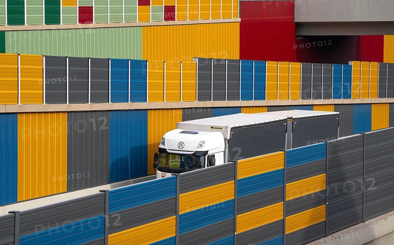 Colourful noise barriers on the A52 motorway, at the Essen-Rüttenscheid junction, the noise barriers were rebuilt in a colourful design as part of the motorway renovation, North Rhine-Westphalia, Germany, Europe