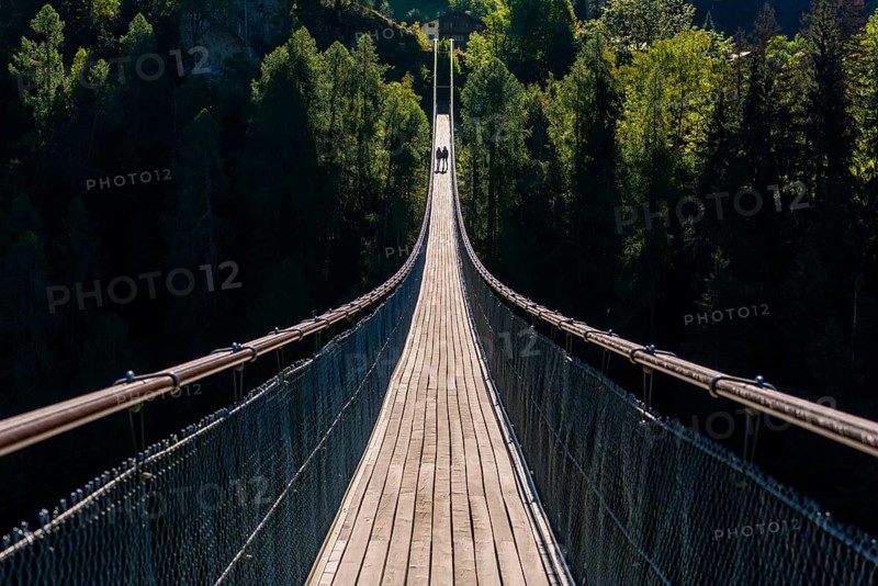 Suspension bridge in Ernen, hike, fear of heights, vertigo, courage, path, overcoming, therapy, evening light, Valais, Switzerland, Europe