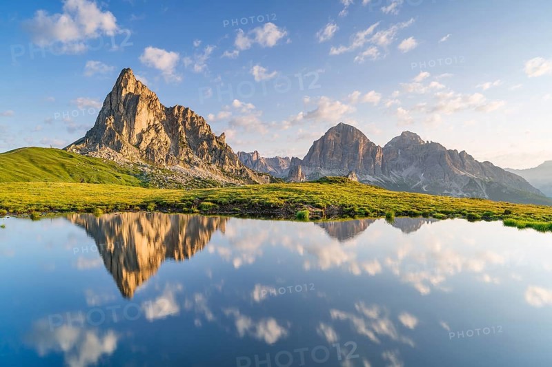 Reflection of the mountains at Passo di Giau, Monte Ragusela, Dolomites, Belluno, Cortina dAmpezzo