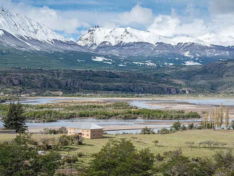 Escuela antigua, historic school, now museum with exhibition, Villa Cerro Castillo, Valley of Rio Ibanez, snow-capped mountains in early spring, Patagonia, Chile, South America