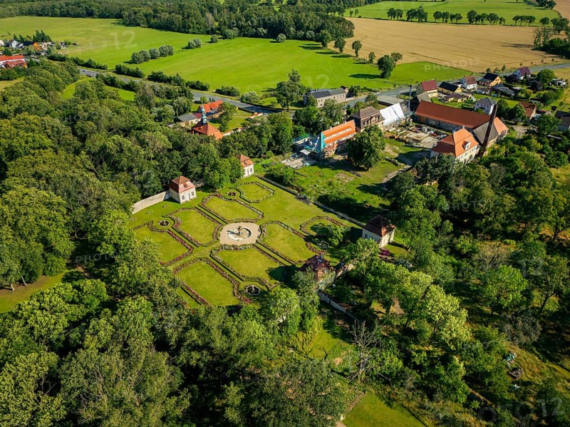 Tiefenau Castle is a heritage-protected castle complex in Tiefenau, a district of the municipality of Wülknitz in the Saxon district of Meissen. The former castle and manor complex, built in the Baroque style at the beginning of the 18th century, can be found with a park, the former castle chapel and a neighbouring cemetery right next to the B 169 federal road. Tiefenau Castle itself was blown up in 1948. Renovation work began on the old manor house in 2019. The park and chapel are now in a well-kept condition and are tourist attractions., Tiefenau Castle Park, Wülknitz, Saxony, Germany, Europe
