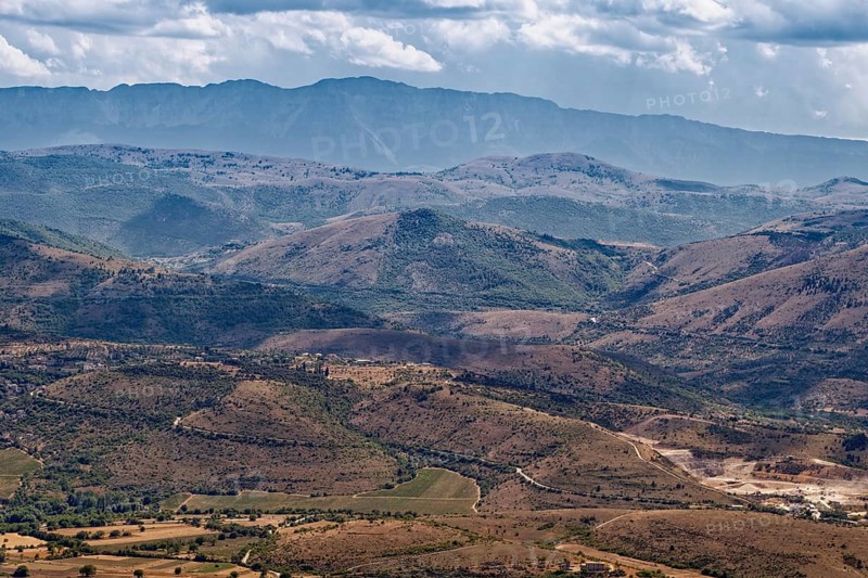 Mountain and hilly landscape around the village of Castel del Monte in the Gran Sasso National Park, Parco Nazionale del Gran Sasso e Monti della Laga, in Abruzzo. Apennines, Italy, Southern Europe, Europe