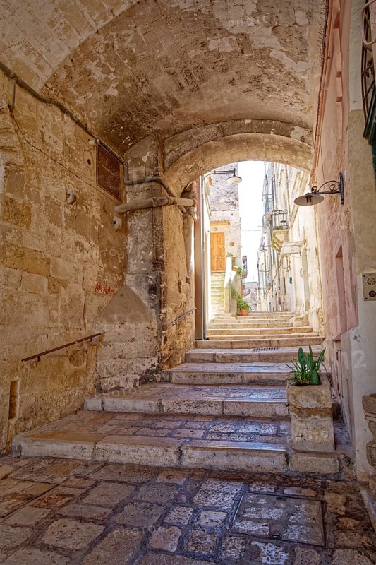Paths and corridors in the tuff of the Sassi Barisano in the cave town of Matera. The cave settlements, Sassi, are a UNESCO World Heritage Site. Matera, Basilicata, Southern Italy, Southern Europe