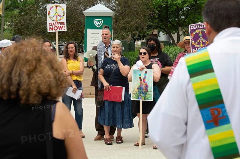 Detroit, Michigan USA, 15 July 2024, Interfaith leaders gathered at Wayne State University to rally and pray for peace in Gaza. They asked that the university divest from companies that profit from war and weapons manufacturing. The university turned on lawn sprinklers all around 'Spirit Rock, ' where they planned to gather. Spirit Rock was the site of a student anti-war encampment that university police broke up in May
