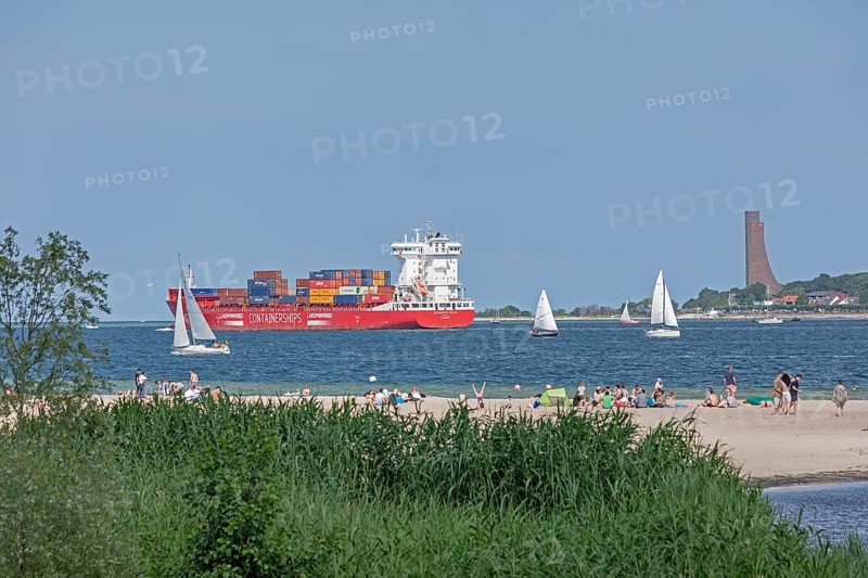 Container ship, sailing boats, people, Kiel Week, naval memorial, Laboe, Falckensteiner Strand, Kiel Fjord, Kiel, Schleswig-Holstein, Germany, Europe
