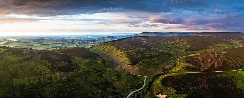 Panorama of Sunset over Cod Beck Reservoir from a drone, North York Moors National Park, North Yorkshire, England, United Kingdom, Europe