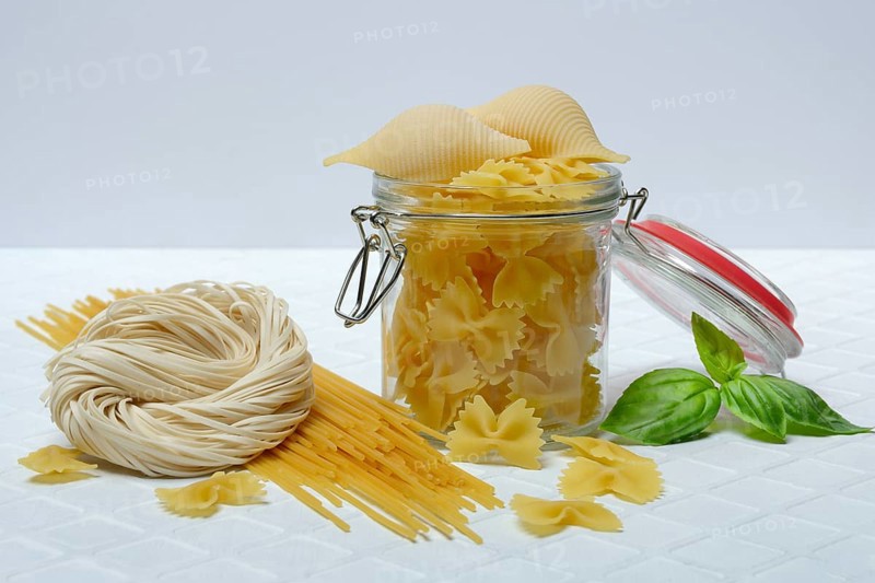 Various types of pasta with glass container, pasta varieties