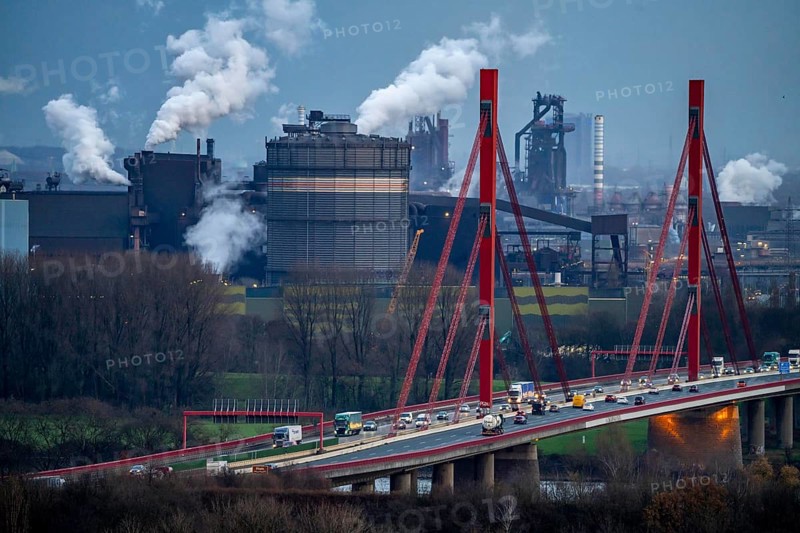 Thyssenkrupp Steel steelworks, blast furnaces 8 and 9, gasometer, motorway bridge of the A42 over the Rhine near Duisburg Beeckerwerth, Duisburg, North Rhine-Westphalia, Germany, Europe