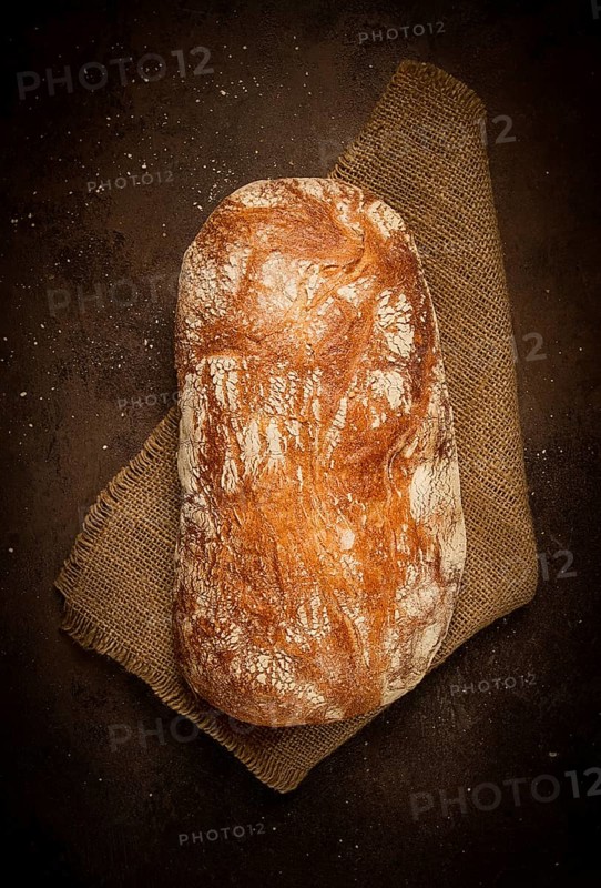 Fresh whole grain bread, rye, top view, without people