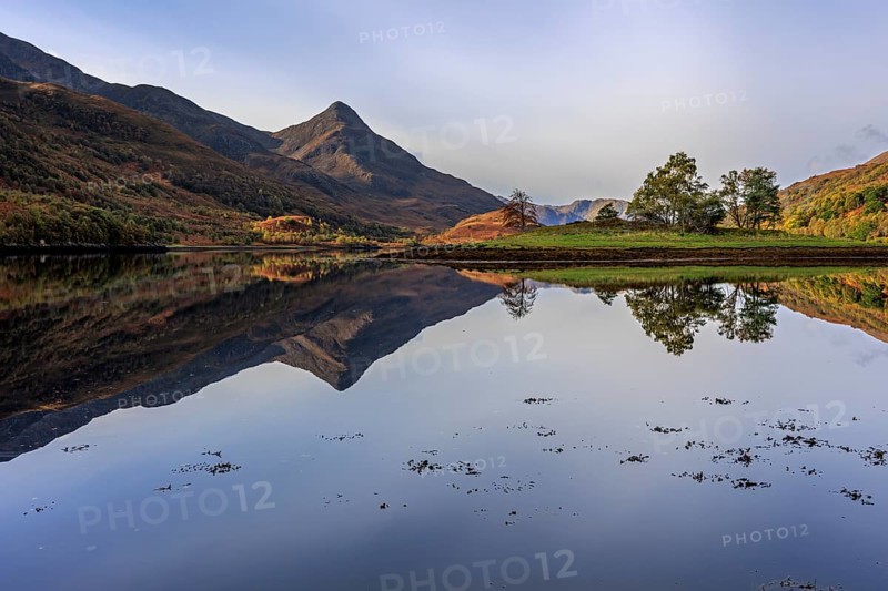 Mountains reflected in fjord, midday light, sunny, still, coast, sea, autumn, autumn colours, Loch Leven, Scotland, Great Britain