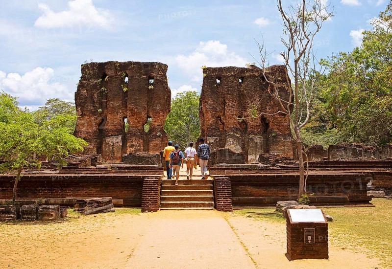 Visitors at the palace of King Parakramabahu in the ruined city of Polonnaruwa, Central Province, Sri Lanka, Asia