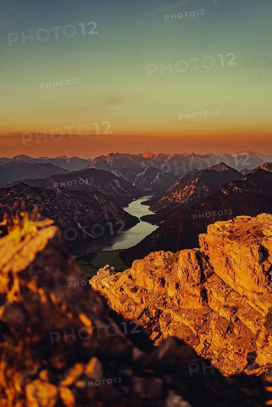 Thaneller summit at sunset in the Lechtal valley in Tyrol with a wonderful view of the surrounding mountains. Tyrol, Austria, Europe