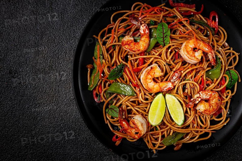 Fried udon noodles with shrimp and vegetables, Asian cuisine, homemade, no people