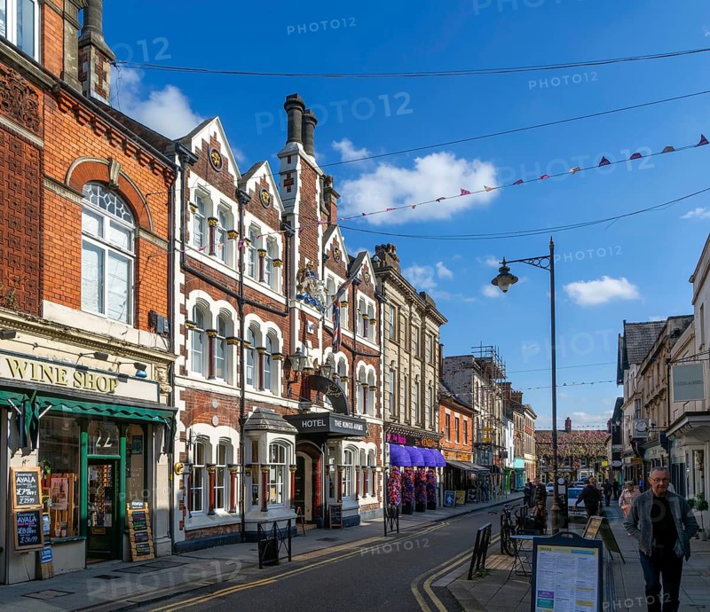 Historic buildings the Kings Arms Hotel and shops in Wood Street, Old Town, Swindon, Wiltshire, England, UK