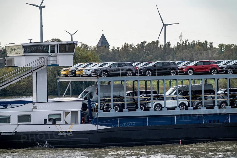Car transporter Freighter Forenso, on the Rhine near Rees, brings Ford Explorer e-cars from the Ford plant in Cologne to the seaports of the Netherlands for onward transport overseas, North Rhine-Westphalia, Germany, Europe