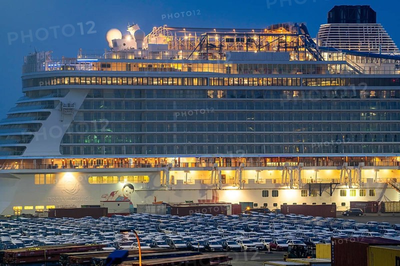 Parking space for import vehicles, hundreds of Hyundai Ioniq, electric cars, waiting for onward transport, cruise ship World Dream, Manara, at the EUROGATE container terminal in the overseas port of Bremerhaven, Lower Saxony, Germany, Europe