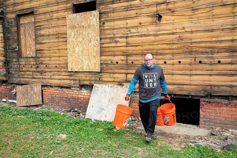 Detroit, Michigan, NW Goldberg Cares, a nonprofit community development corporation, rebuilds a neglected old house in the NW Goldberg neighborhood. Volunteers from Rocket Mortgage helped with the work