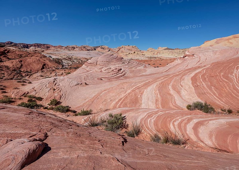 Layered rock formations along the Fire Wave Trail at Valley of Fire State Park near Overton, Nevada