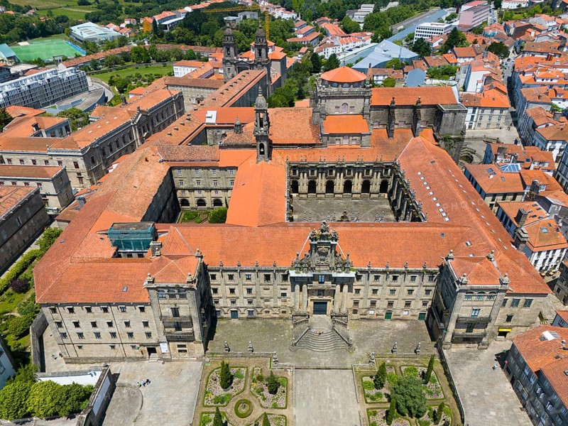 A large historic monastery building with a central courtyard and orange-coloured roofs, aerial view, Mosteiro de San Martiño Pinario, Monastery of San Martino Pinario, Santiago de Compostela, autonomous community of Galicia, place of pilgrimage, destination of the Way of St. James, Spain, Europe