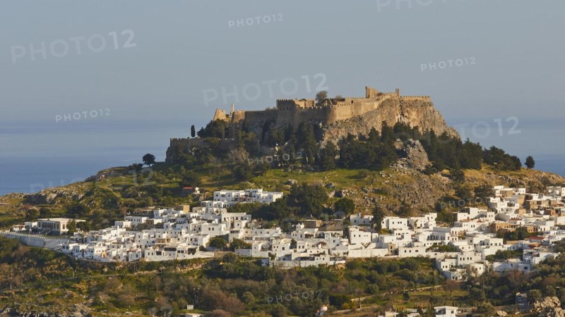 Evening light or late afternoon light, Acropolis and St John's Fortress of Lindos, Lindos village, Rhodes, Dodecanese, Greek Islands, Greece, Europe