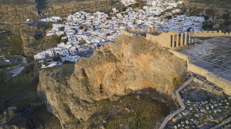 Drone shot, first morning light, Lindos, Acropolis of Lindos, Aerial view of the Acropolis of Lindos on a cliff above the city in the evening light, Archaeological site, Lindos, Rhodes, Dodecanese, Greek Islands, Greece, Europe