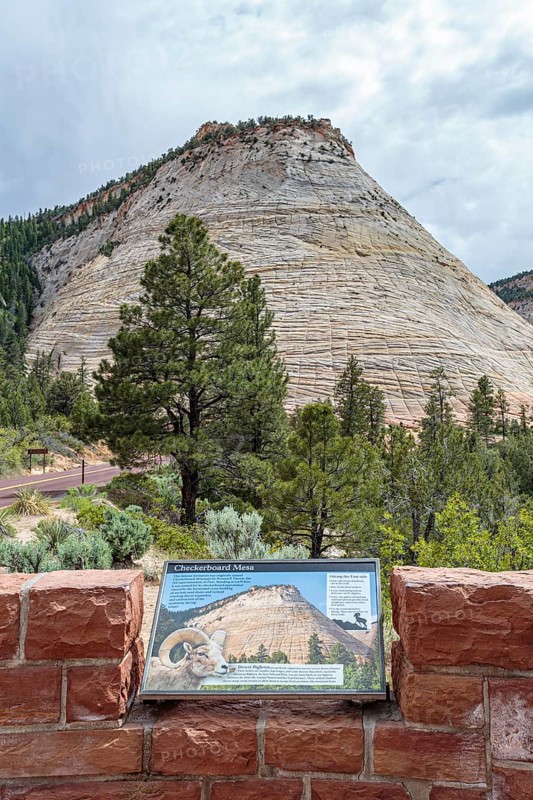 Informative sign explains the rock formations in the Checkerboard Mesa area of Zion National Park, Utah