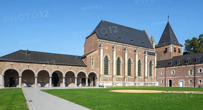 Outer court, arcade and Baroque church of Commandery of Alden Biesen, 16th-century castle at Rijkhoven, Bilzen, province of Limburg, Flanders, Belgium, Europe