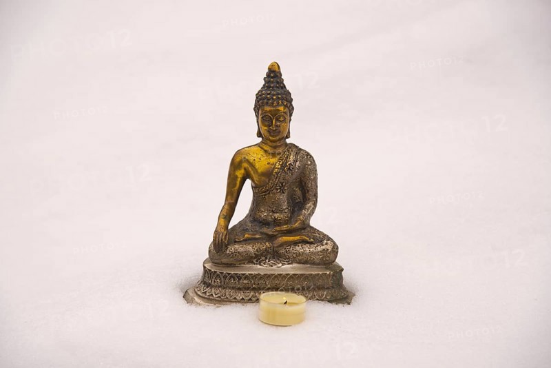 Bhumispara-mudra: Buddha Gautama in the moment of enlightenment, statue in the snow, Oytal, Allgaeu, Bavaria, Germany, Europe