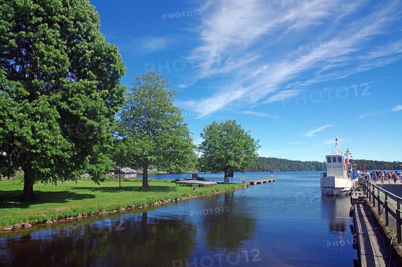 Canal-like still water and a wooden passenger ship, Haverud Aqueduct, Dalsland Canal, Västra Götaland, Sweden, Europe