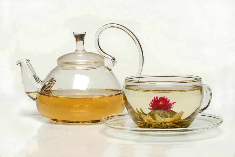 Cup with flower tea, Tea flower 'Petite Princesse', White tea with jasmine and amaranth blossoms, Teacup, Teapot