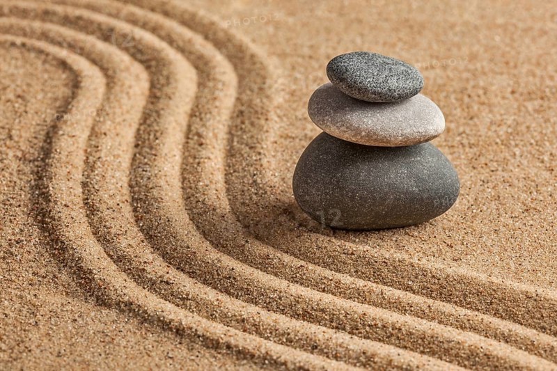 Japanese Zen stone garden, relaxation, meditation, simplicity and balance concept, pebbles and raked sand tranquil calm scene