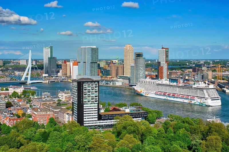 ROTTERDAM, NETHERLANDS, MAY 14, 2017: View of Rotterdam city and the Erasmus bridge Erasmusbrug over Nieuwe Maas river with cruise liner from Euromast