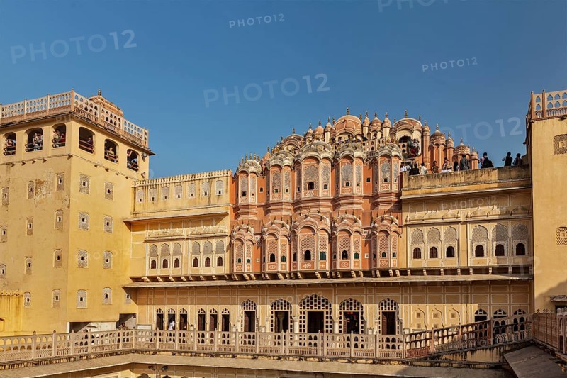 JAIPUR, INDIA, NOVEMBER 18, 2012: Tourists visiting Hawa Mahal palace (Palace of Winds), famous Rajasthan landmark